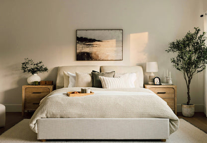 modern bed with padded headboard and minimalist upholstered base