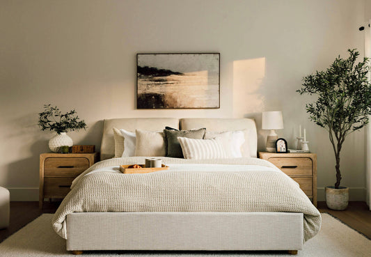 modern bed with padded headboard and minimalist upholstered base