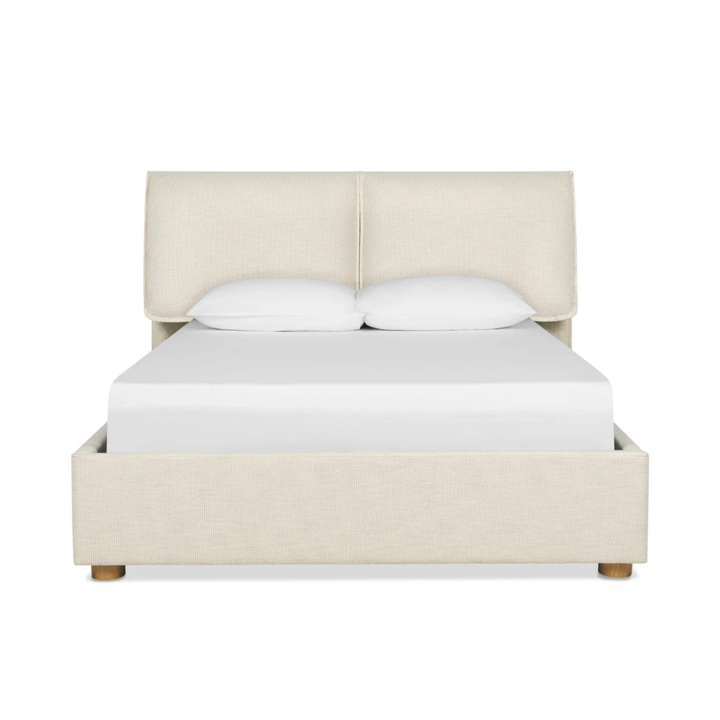 nomad bed with upholstered headboard and soft neutral fabric