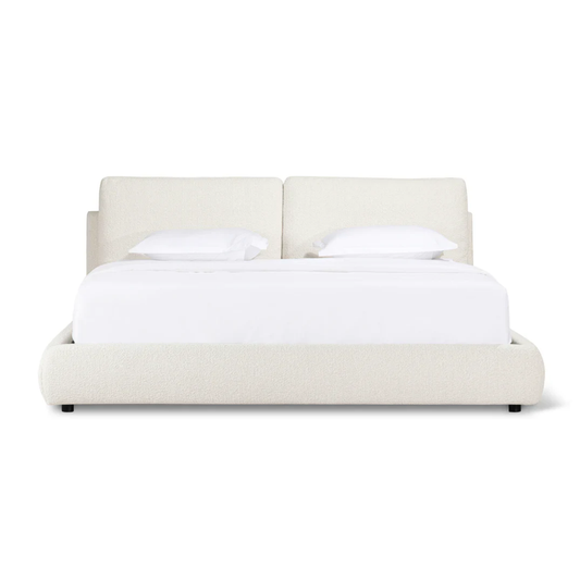 nuag bed with structured upholstered headboard and clean lines