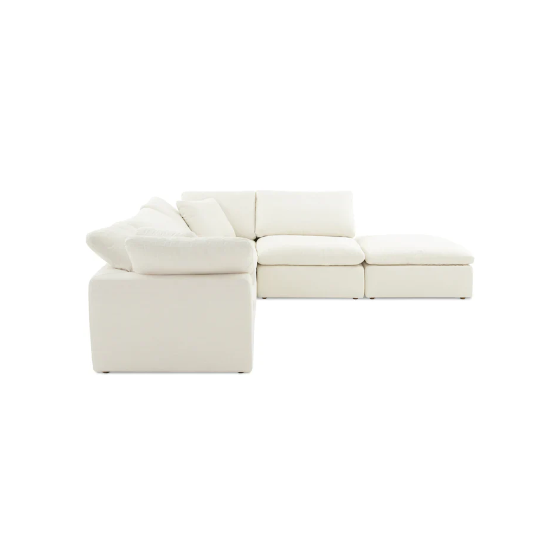 large modular L shape open end sofa with matching stool featuring plush cushions and flexible arrangement options
