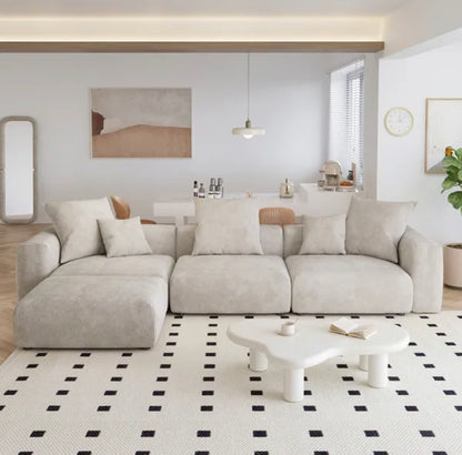 luxury modular sofa set upholstered in high-quality fabric with matching footstool for added comfort
