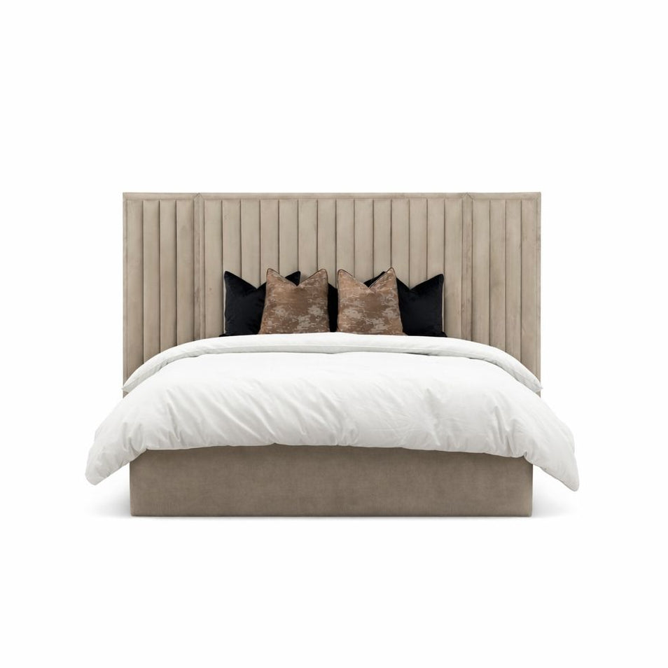 Strong panelled design softened by a fully upholstered, inviting frame