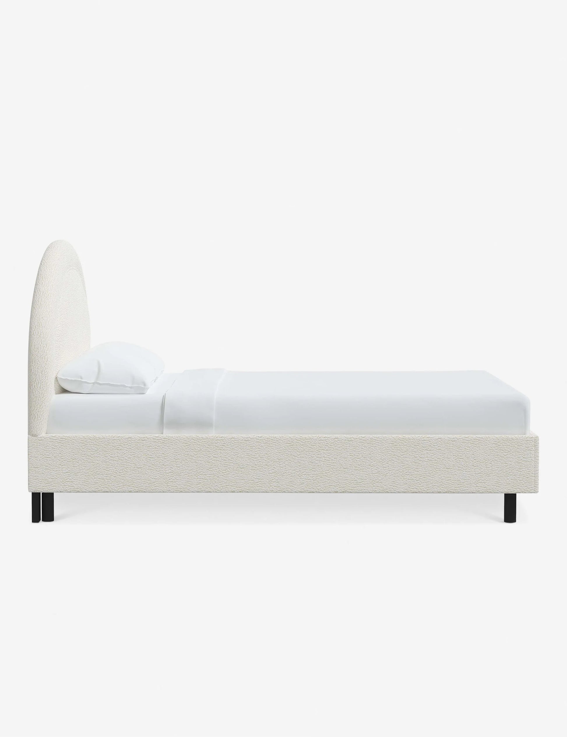 contemporary bed with bold headboard and neutral fabric