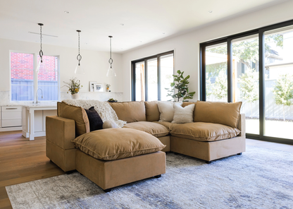 Clean architectural lines are softened by relaxed cushioning, creating a perfect balance of structure and comfort. Upholstered in your choice of premium fabric and supported by a durable hardwood frame, every detail is considered for both style and longevity.
