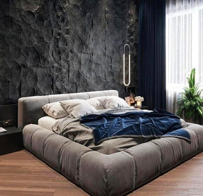 luxury bed with refined upholstery and structured silhouette