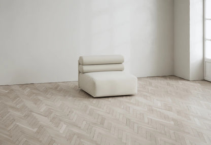 Roma single seat module upholstered in luxury fabric with clean modern lines
