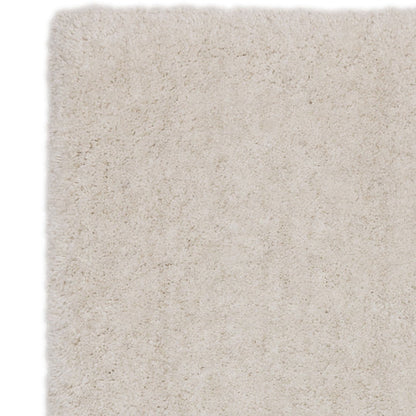 An angled studio shot capturing the Rosera Rug’s understated off white weave pattern, natural texture variation, and artisanal character on a white background.