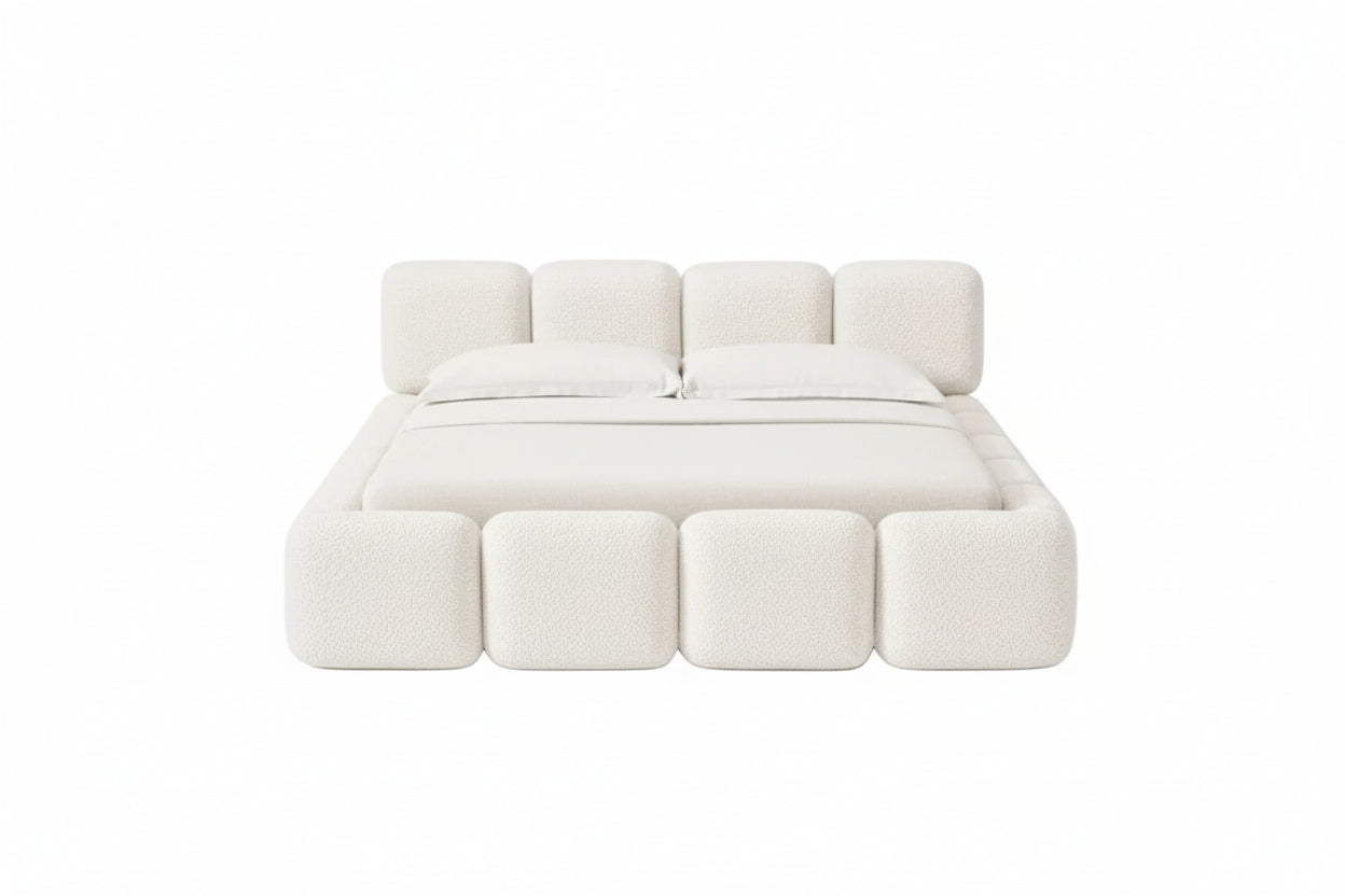 Bold upholstered design with rounded block detailing and soft architectural presence
