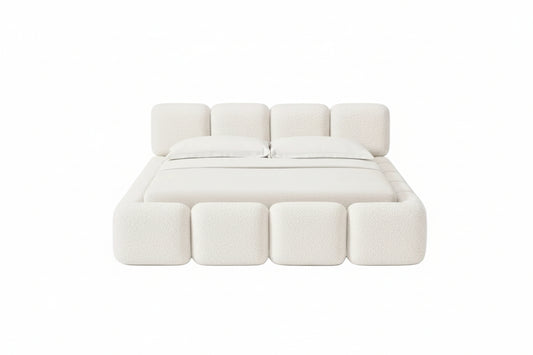 Bold upholstered design with rounded block detailing and soft architectural presence