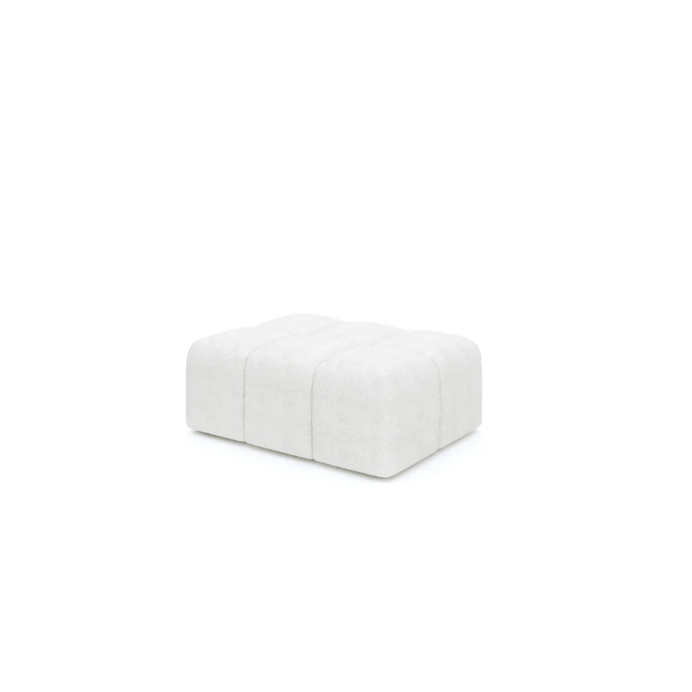 A white square-shaped footstool with hidden feet and a solid hardwood frame, part of the Sienna Modular Collection.