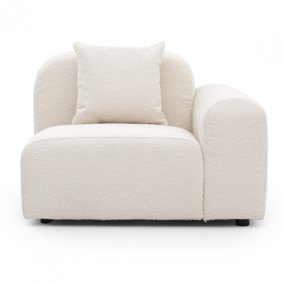 single arm modular sofa unit with soft upholstery and sleek low-profile silhouette
