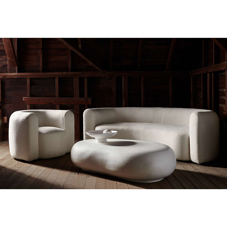 Snug love seat with soft cushions and clean lines