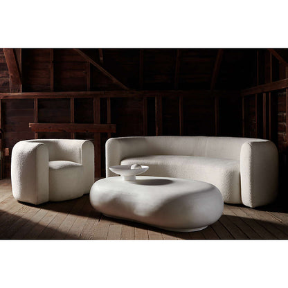 Snug love seat with soft cushions and clean lines