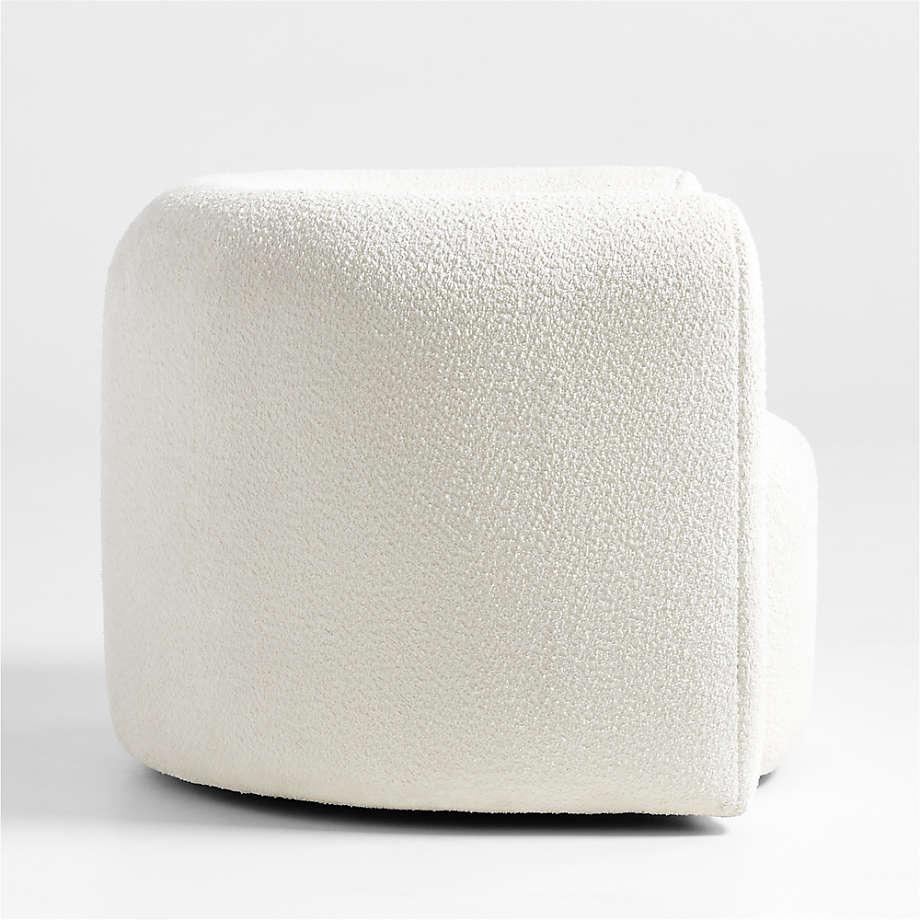 Side angle of Snug swivel chair showing rounded form