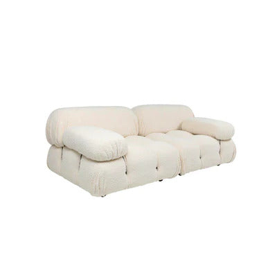 modern 2 seater bouclé sofa with deep seating and soft sculpted silhouette