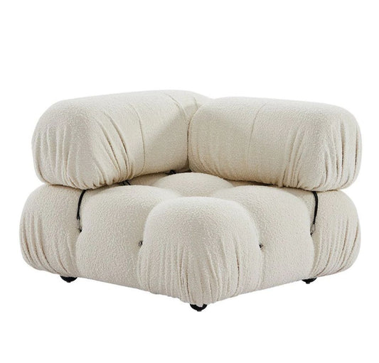 Storm bouclé corner module with plush textured upholstery and modular contemporary design