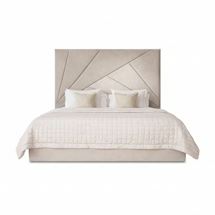 valanza bed with sculptural angled headboard and upholstered base