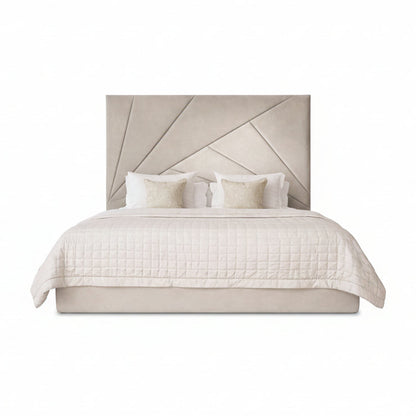 valanza bed with sculptural angled headboard and upholstered base