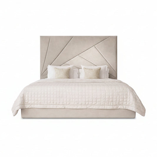 valanza bed with sculptural angled headboard and upholstered base