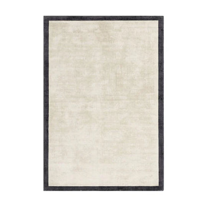 Beige rug with a black border on a white background