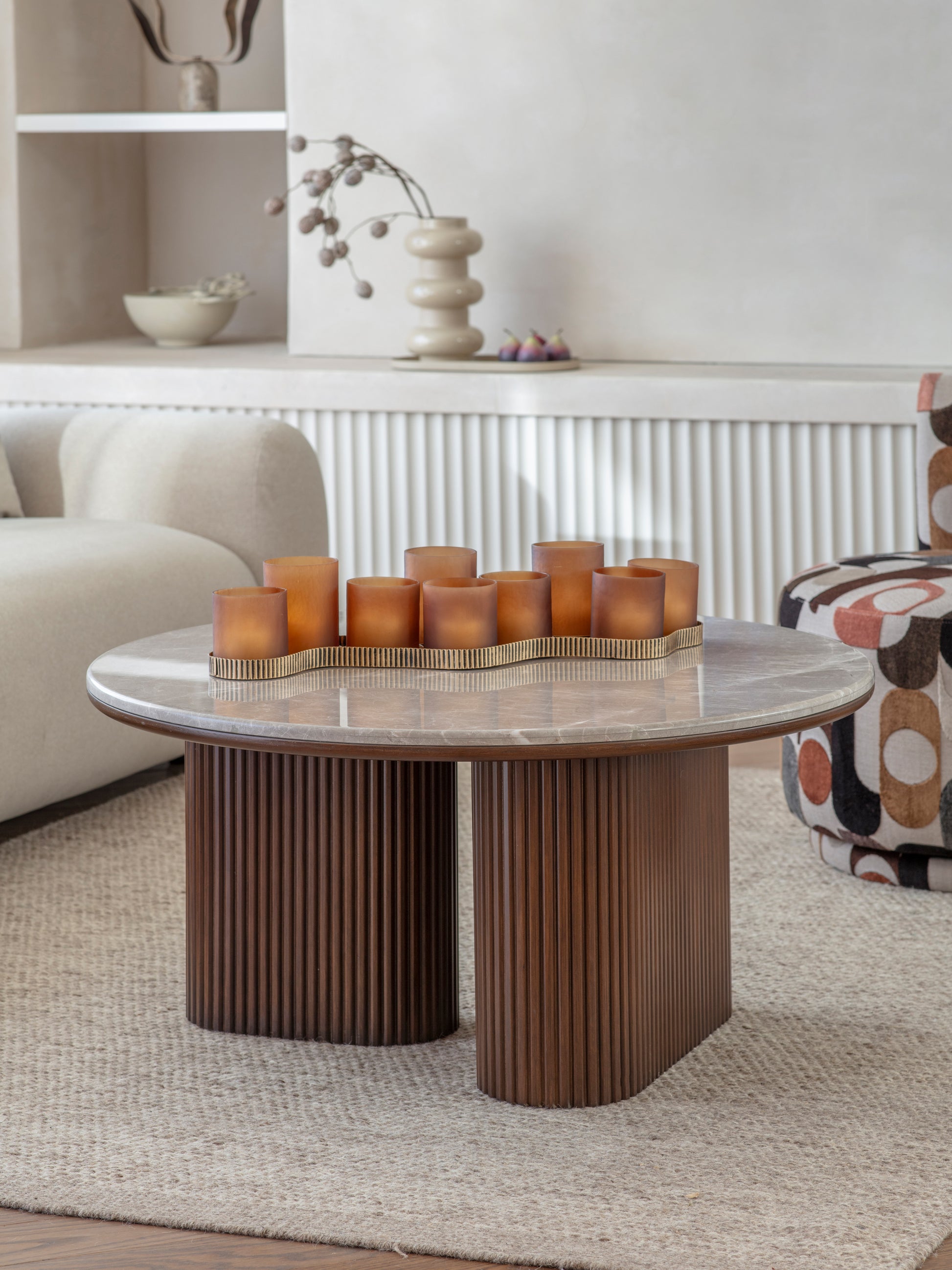 A detailed close-up showcasing the natural variation of the tabletop surface, highlighting subtle tonal movement and organic marble texture.