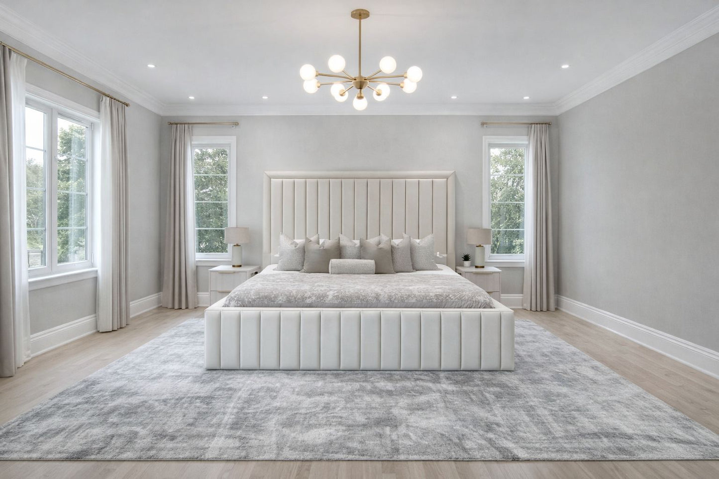 upholstered bed with vertical channelling and neutral fabric finish